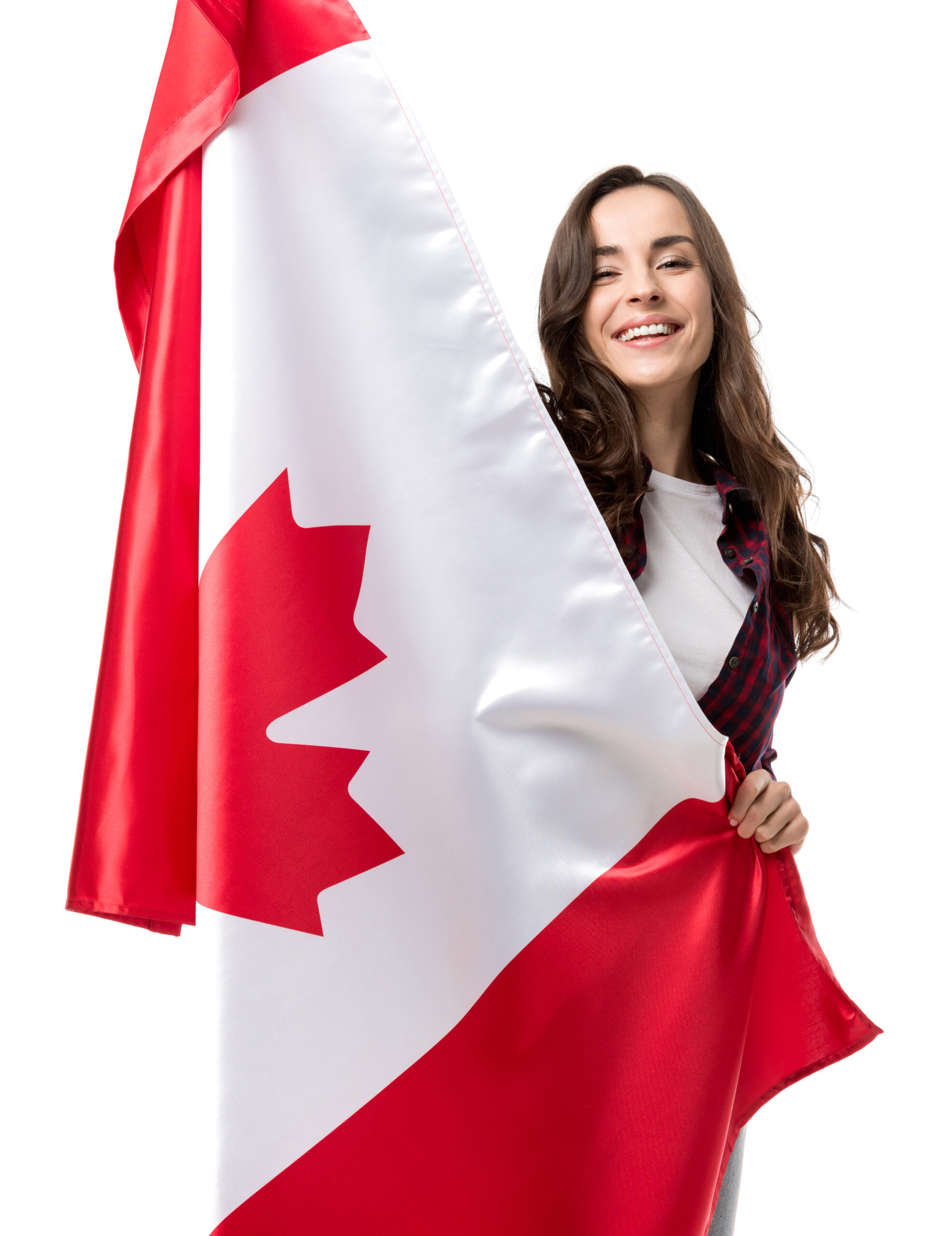 beautiful happy woman holding canadian flag isolated on white